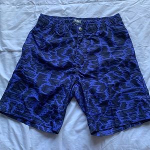 Blue and black swim trunks